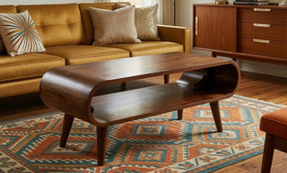 Mid century modern coffee table in a stylish living room with sofa and decorative objects