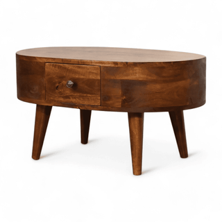 Angled perspective of an oval coffee table featuring a sleek single drawer and tapered legs in a chestnut finish. 