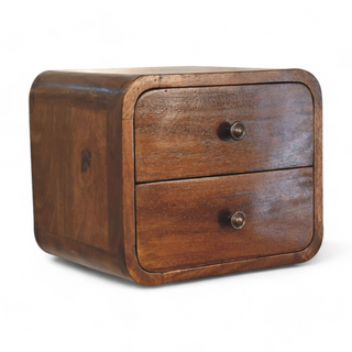 Angled side view of the wooden nightstand showcasing its two drawers and smooth finish.