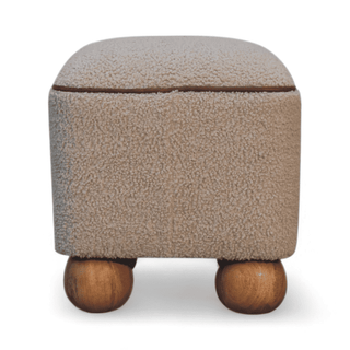 Beige square footstool with soft upholstery and round wooden legs, front view. 