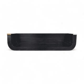 Front view of a black wooden floating shelf with curved edges and brass corner accents, showcasing its sleek and modern design.