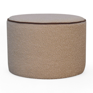 Cream Bouclé Ottoman with a minimalist cylindrical design, featuring smooth upholstery and fine stitching details.