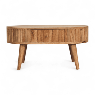 Front view of a vintage round coffee table with a drawer, crafted from solid mango wood in a light natural finish.