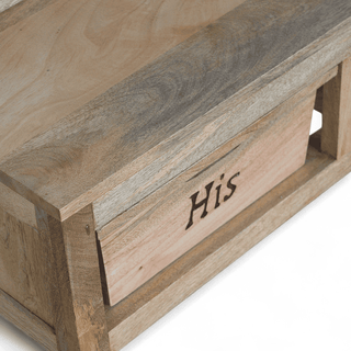 Close-up of the engraved "His" lettering on the front drawer of a mango wood storage bench, showing wood grain detail