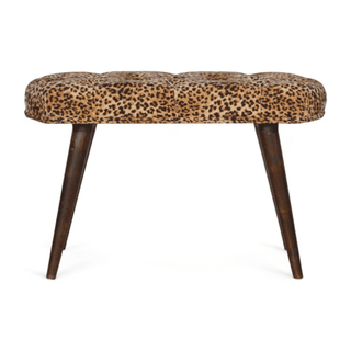 Front view of the Leopard Print Bench showcasing its luxurious cotton velvet upholstery and sleek walnut-finish mango wood legs.