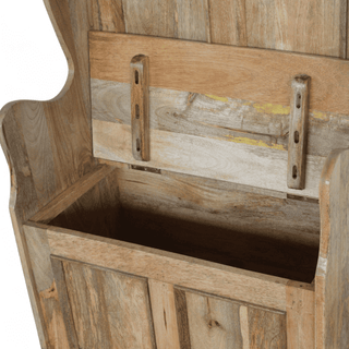 Mango wood monk's bench with the hinged seat lifted to reveal the interior storage box