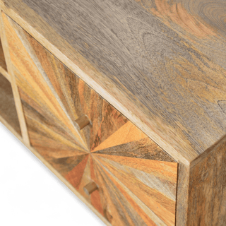 Close-up of the sunburst wood inlay pattern on the top corner of the Sunrise TV stand