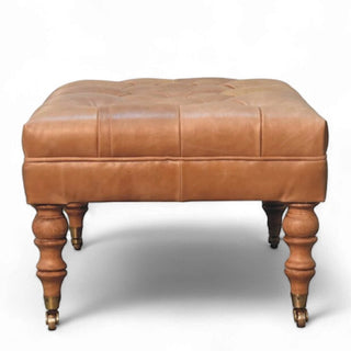 Buffalo Tan Leather Ottoman with Castor Legs