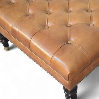 Studded Buffalo Tan Leather Ottoman with Castor Legs