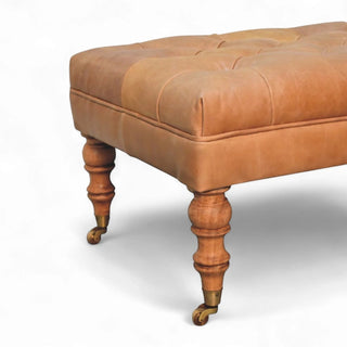 Buffalo Tan Leather Ottoman with Castor Legs