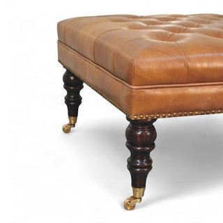 Studded Buffalo Tan Leather Ottoman with Castor Legs