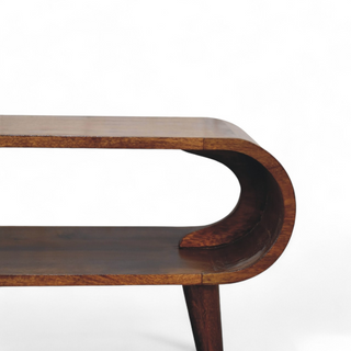 Alternate angle of the mid-century coffee table, featuring curved edges and rich chestnut finish.

