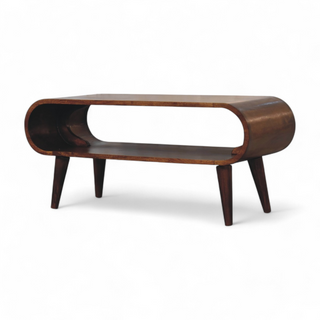 Side angle of the mid-century modern coffee table showcasing its smooth curved edges and Nordic-style legs. 
