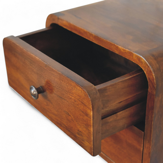 Open top drawer of the chestnut nightstand revealing its spacious interior.
