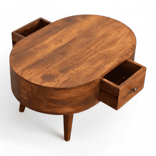 Open drawers of the oval coffee table, displaying its inner storage space and wooden knob.