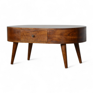 Angled front-left view of the oval wooden coffee table highlighting its sleek design, central drawer, and sturdy tapered legs.