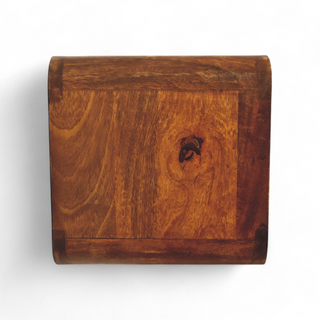 Top view of the chestnut nightstand showcasing its smooth wood grain texture and natural finish.
