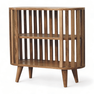 Angled front view of the vintage wooden cabinet showcasing its curved slatted frame and two-tier open shelving.