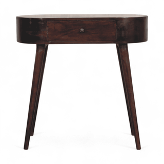 Front view of a dark wood vintage mid-century modern writing desk, featuring a single central drawer with a round knob and tapered legs.