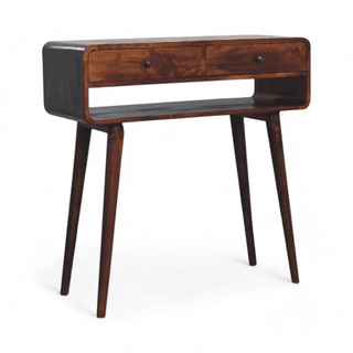 Right-angled view of a dark wooden console table with a black accent frame, open storage shelf, and tapered legs for a sleek look.