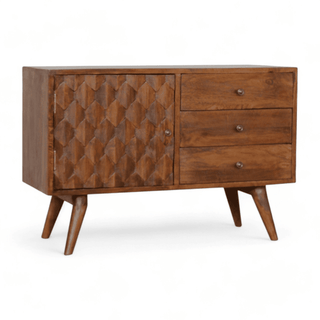Angled front view of the vintage sideboard highlighting its geometric design door, three drawers, and tapered legs.