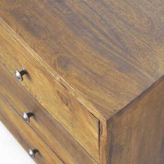 Close-up of the mango wood texture and finish on the vintage sideboard, highlighting its natural grain.