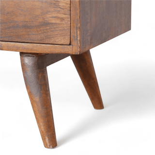 Close-up of the tapered legs on the vintage sideboard, showcasing its sturdy and minimalist design.