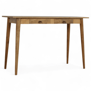 Angled front view of a light wooden writing desk featuring a single drawer with a round knob and sleek tapered legs, showcasing its minimalist design.