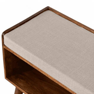 Close-up of the Vintage Chestnut Bench, featuring the padded linen top and open chestnut wood compartment design. 