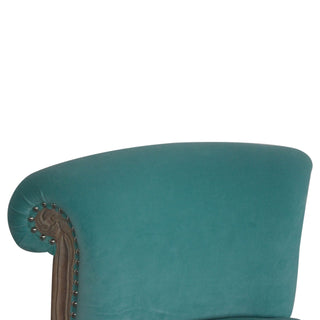 Close-up of fabric texture on Aqua Velvet Studded Chair, showing the upholstered seat, legs and silhouette