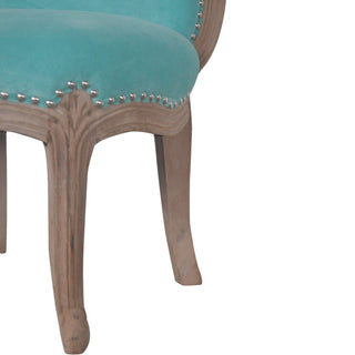 Seat detail view of Aqua Velvet Studded Chair, showing the upholstered seat, legs and silhouette