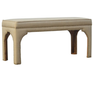 Angled view of Arco Hallway Bench Mud Linen Fully Upholstered Arched Cut-Out Legs Antique Stud Trim