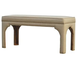 Front view of Arco Hallway Bench Mud Linen Fully Upholstered Arched Cut-Out Legs Antique Stud Trim