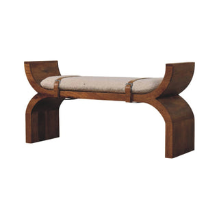 Angled view of Arcus Entryway Bench Amber Oak Arched X-Frame bouclé Seat Leather Stirrup Straps