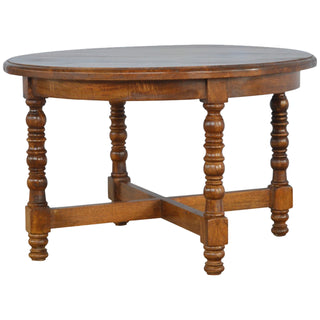 Side angle view of Arlo Round Side Table Turned Legs X-Stretcher Mango Wood Chestnut