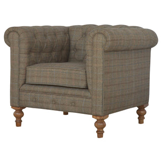 Side angle view of Baxter Armchair Multi Tweed Chesterfield Buttoned Bleached Turned Leg