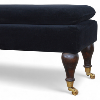 Back view of Black Velvet Upholstered Bench with Castor Legs, showing the upholstered seat, legs and silhouette