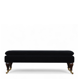 Front view of Black Velvet Upholstered Bench with Castor Legs, showing the upholstered seat, legs and silhouette