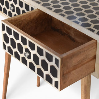 Side angle view of Bone Inlay Console Table Honeycomb Black White Glass Knobs