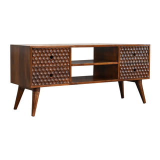 Side angle view of Brio Media Unit Chestnut Mango Wood Circular Bubble-Relief Carved Doors with Nordic Legs
