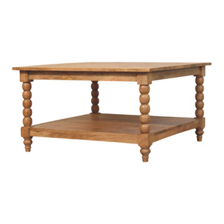 Side angle view of Brock Square Coffee Table Solid Mango Wood Bobbin Turned Legs Lower Shelf Golden Teak