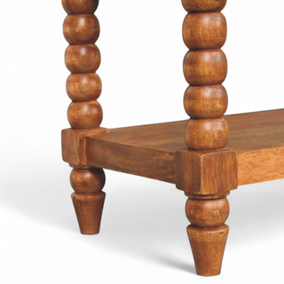 Leg detail view of Brown Leather and Solid Wood Spindle Bench with solid wood brown leather
