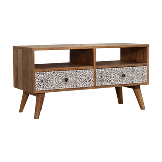 Side angle view of Calla Media Unit Oak Mango Wood Black and White Cobweb Screen-Printed Drawers with Nordic Legs