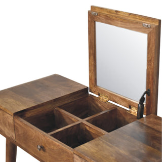 Angled detail view of Contour Curve Dressing Table, showing the tabletop, frame and furniture finish