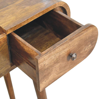 Top view of Contour Curve Dressing Table, showing the tabletop, frame and furniture finish