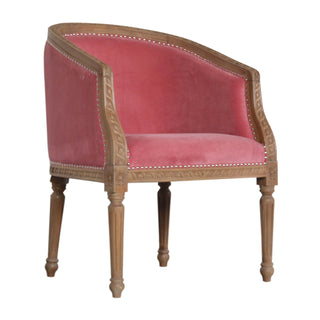 Angled view of Coral Accent Chair Pink Velvet Studded Open Frame Turned Leg
