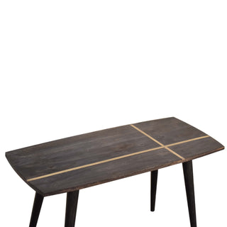 Angled detail view of Crest Coffee Table Solid Mango Wood Brass Cross Inlay Top Ash Black Nordic Legs