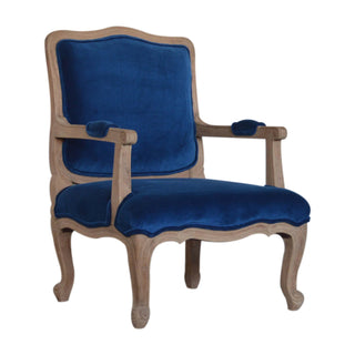Angled view of Delphine Armchair Royal Blue Velvet French Style Carved Cabriole