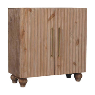 Side angle view of Driftwood Sideboard Cabinet with Fluted Pine Doors and Bun Feet in Stonedrift Finish