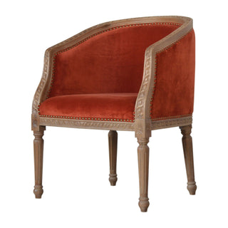 Angled view of Ember Accent Chair Rust Velvet Studded Open Frame Turned Leg